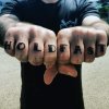 man-with-hold-fast-knuckle-tattoo.jpg
