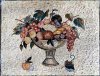 This piece displays a still-life of fine fruits. Such a mosaic might be displayed in the entrance or wall of a fruit merchant or Shalheranite Temple.